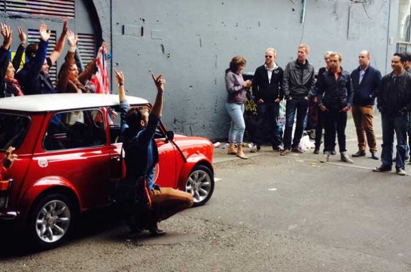 red mini cooper group of people
