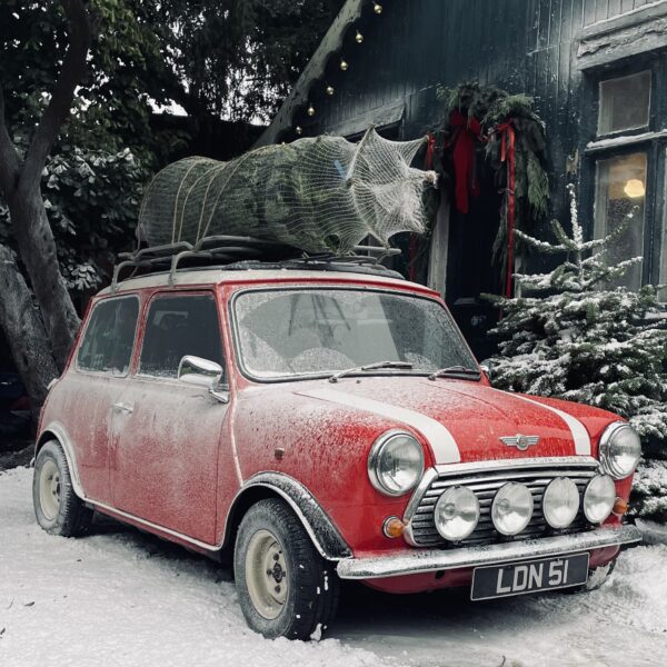 smallcarBIGCITY classic red mini christmas tree London snow