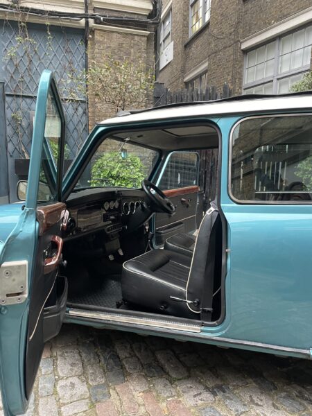 Classic-Mini-Cooper-Hire-London-Blue-Mini-Court-Yard-interior-passenger