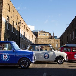 blue, white, red classic mini cooper side on