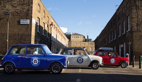 blue, white, red classic mini cooper side on