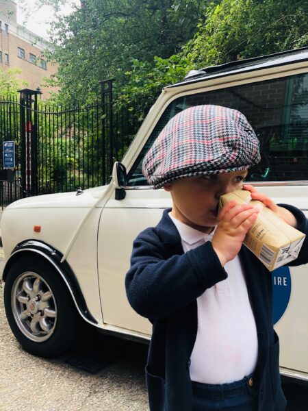 London for kids tour by smallcarbigcity child drinking mini cooper