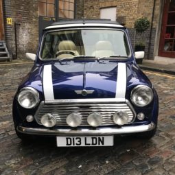 Dot D13LDN classic Mini Cooper Sports Pack in blue in London court yard front bonnet view - smallcarBIGCITY
