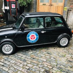 Classic Mini Cooper Hire London Cilla Black Bleeding Hearts Yard side