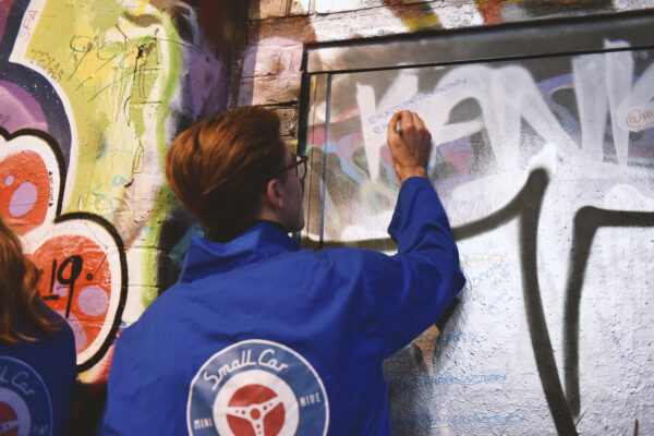 Banksy Street Art tour London - James having a go in Leake street smallcarBIGCITY