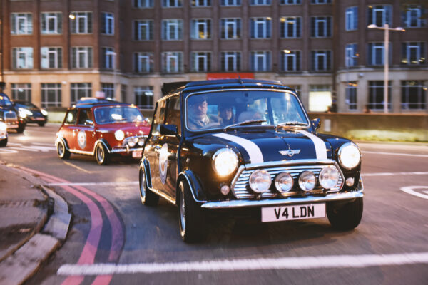 London by night tour - classic mini Coopers full beams ahead smallcarBIGCITY