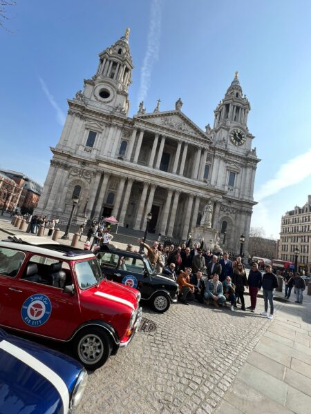 small-car-big-city-private tours of london in classic car group shot by st pauls landmarks