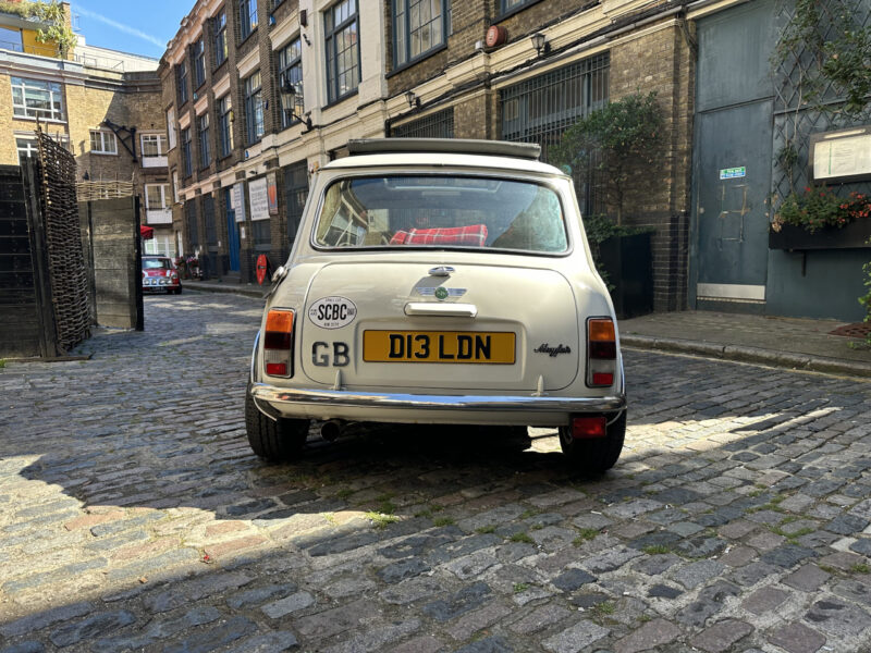 Classic White Mini Cooper hire london small car big boot rear