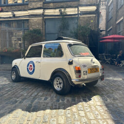 Classic White Mini Cooper hire london small car big rear quater
