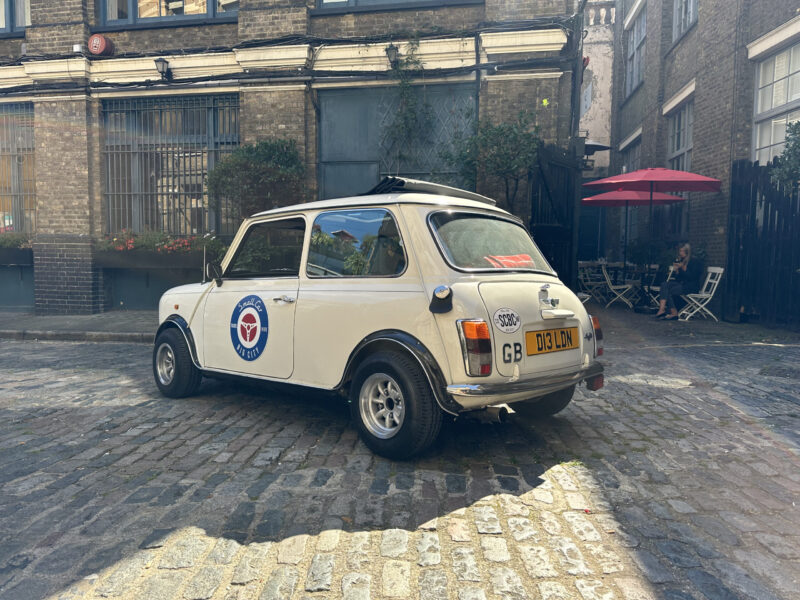 Classic White Mini Cooper hire london small car big rear quater