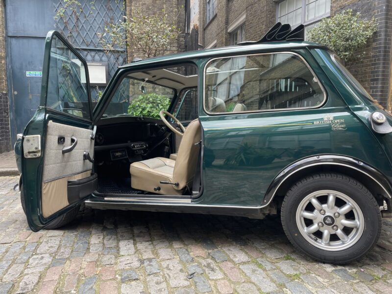 BRG Classic Mini British open Classic 1992 green front Lilibet by smallcarBIGCITY passenger door interior