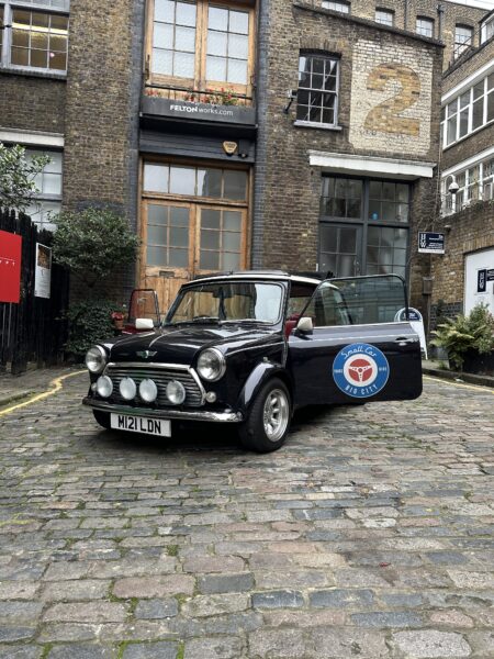 smallcarBIGCITY Classic Mini Cooper Hire London Car Stella Front angle dor open
